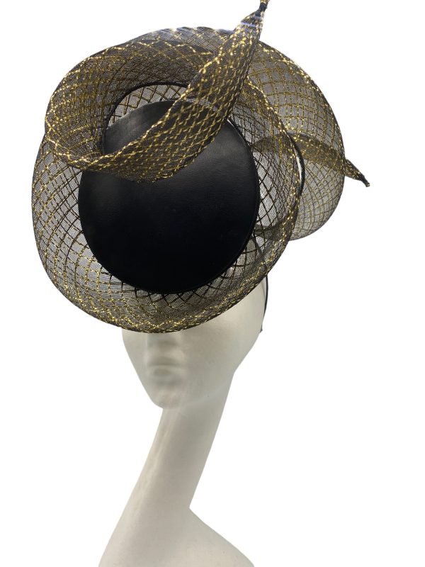 Black leather percher with black/gold window crin detail in a swirl design.